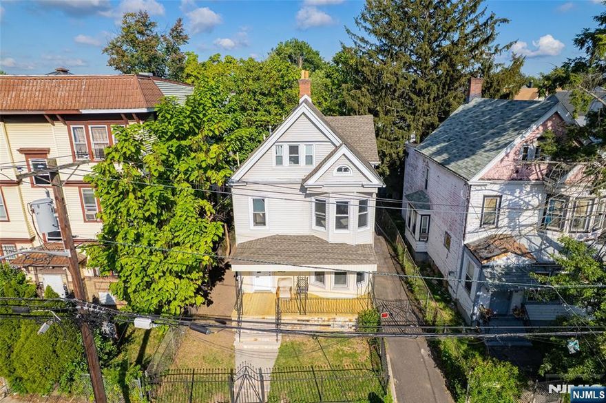 EXCEPTIONAL INVESTMENT OPPORTUNITY! Recently updated two-family home in Lower Clinton Hills on oversized lot with parking for 4-6 cars. Second floor features spacious 4BR/2BA unit. First floor offers comfortable 2BR/1BA unit. Large private backyard ideal for entertaining and relaxation. Easy to show with flexible access. Well-maintained property with modern updates throughout. Ample off-street parking eliminates tenant concerns. Generous lot size provides privacy and future expansion possibilities. Perfect for investors seeking dual income streams or owner-occupants. Convenient transportation, and ongoing revitalization. Property condition allows immediate rental income with minimal capital investment required. Schedule your showing today!