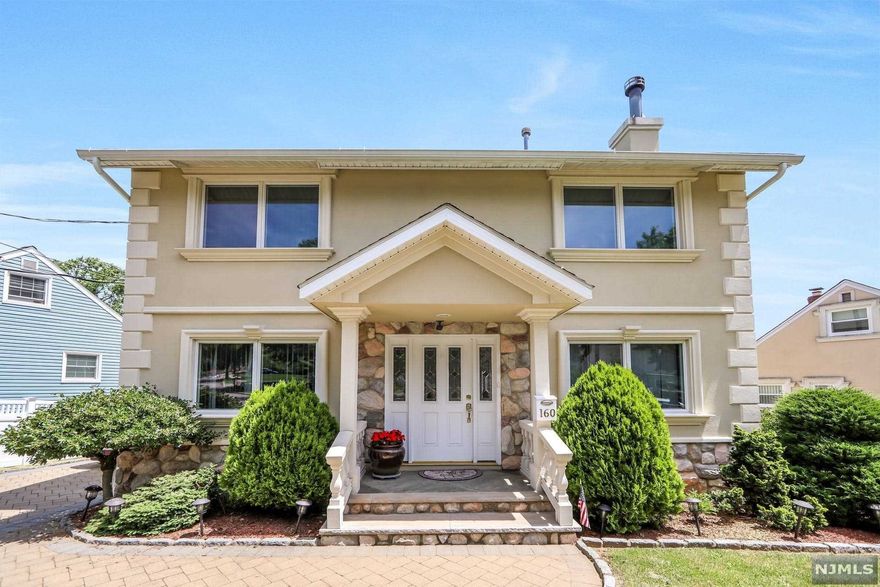 Warm, light-filled, impeccably maintained 4-bedroom, 3 full bath Center Hall Colonial offers 1932 square feet of elegantly appointed, thoughtfully designed comfort a pretty landscaped lot. Framed by mature trees, the stucco facade opens to a warm neutral palette of generous crown molding, gleaming hardwood flooring, granite and natural stone. The 1st floor offers a Living Room with fireplace, formal dining room w/French door to deck, updated kitchen w/granite/SS appliances, sitting room w/wet bar, and full bath. The 2nd floor features the owner's suite w/full bath, 2 walk-in closets, two family sized bedrooms and a full bath. The 3rd floor offers a large bedroom with generous sized closets. The lower level is not to be missed, it features a Recreation room, wine room, laundry and entry to yard. The property has been gracefully designed as a stylish and functional extension of the home. The well-sized deck is suited for incredible dining and entertaining.