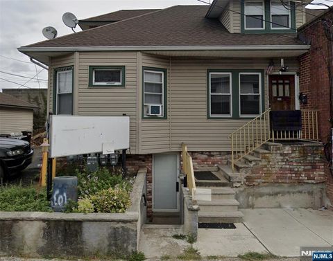 Photo of 103 Broadway #Bsmt, Elmwood Park, NJ 07407 (MLS # 25025428)