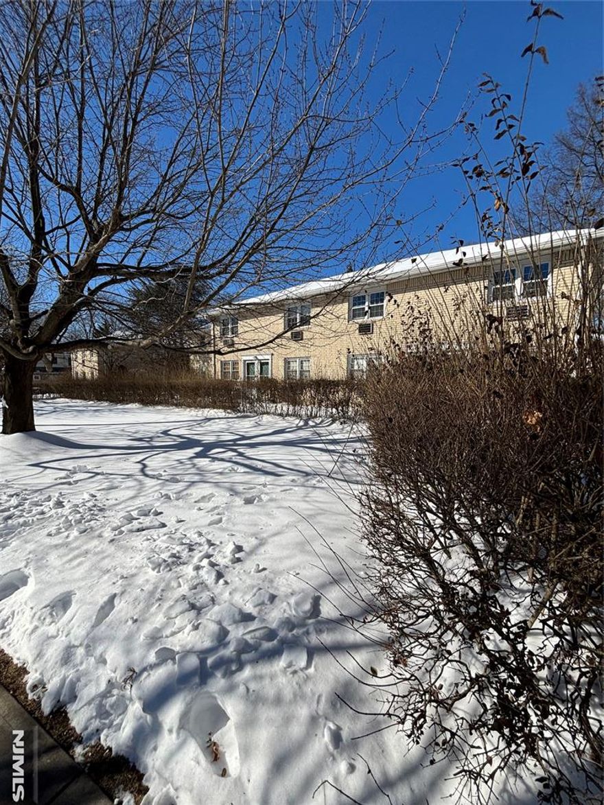 Ideally situated between the Watchung Avenue and Upper Montclair train stations, this location is perfect for commuters traveling to New York City. Nestled on the second floor, the unit is bathed in natural light. It features a spacious living room, a dining room, a galley kitchen, a king-sized bedroom, and a full bathroom. Sliding glass doors off the dining room lead to a private balcony, enhancing the living space. The unit also includes a deeded one-car garage, with laundry and storage facilities available in the basement. Additionally, it boasts excellent proximity to parks, shopping centers, restaurants, bus lines, and all that Montclair has to offer. With a touch of tender loving care, this condo has the potential to meet all your desires.