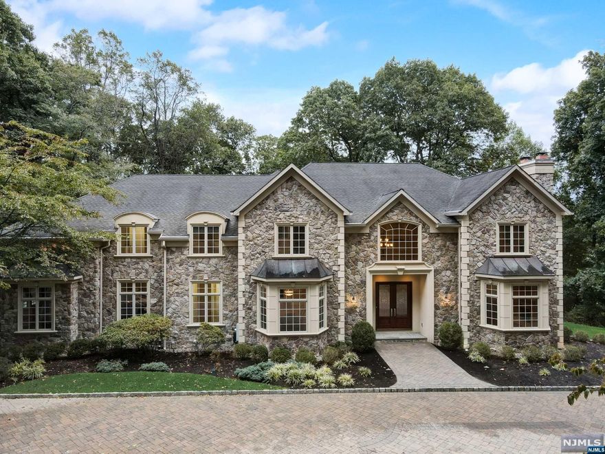 This once builder-owned 7,688 square foot 15-year young estate, situated on 6 acres, boasts an award-winning radiant floor heating system for maximum comfort and enjoyment. Built to impress, this home offers high-end appliances including sub-zero and bosch, a custom-made free floating staircase, a master bedroom suite with FP, bar/fridge, a spa tub, and dual showers with steam. Four bedrooms with walk-in closets and attached bathrooms, a large bonus/game room, two laundry rooms as well as a first-floor full bed/bathroom. Close to NYC, excellent schools ranked 57thin the state, a home warranty plan for worry-free ownership, lifetime warranty from gutter helmet, a walkout patio and a hot tub. Nothing has been overlooked in this home for a family to enjoy for generations.