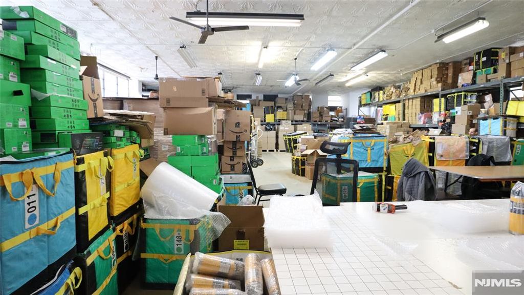 Photo of 395 Henry Street, Fairview, NJ 07022 (MLS # 25042466)