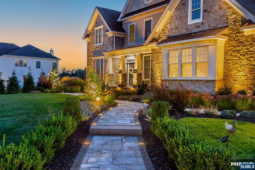 Luxury Estate in The Preserve at Upper Saddle River This exquisite 6-bedroom, 8.5-bathroom estate in the prestigious Preserve at Upper Saddle River offers timeless elegance and resort-style living. Located in the highly rated Upper Saddle River school district, this home features custom trim work, a home office, and a fully finished basement with gym, steam room, guests suite, and a media lounge with large-screen TV and built-in surround sound. Step into a magazine-featured backyard oasis with a saltwater pool (auto-cover), luxurious pool house with wood-burning fireplace, hot tub, sunken gas fire pit, and a chef-grade outdoor kitchen (BBQ, cooktop, fridge), all connected to a seamless outdoor sound system. Professionally designed, deer-resistant landscaping ensures year-round beauty even in winter and is complemented by raised garden beds, a playground, and a tree-lined perimeter for privacy and serenity. Additional highlights include four HVAC zones, a whole-house generator, custom blinds, built-in closets and pantry, an extended driveway, and dual walkways leading to the home's full stone fa ade. Public water/sewer, underground electric and fiber, and an Aquathin whole-house water filtration and softener system.