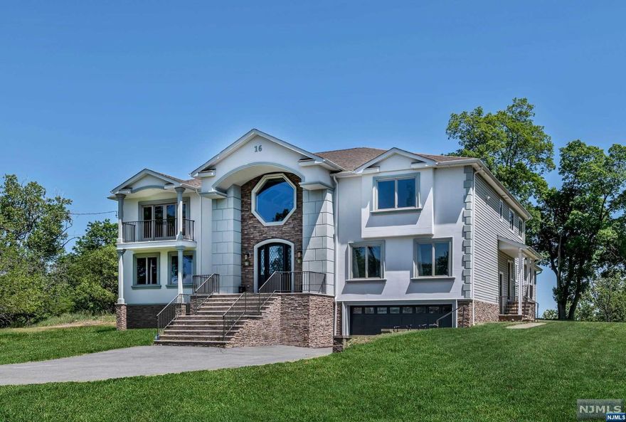 FABULOUS OPPORTUNITY TO OWN THIS NEWER CONSTRUCTION HOME JUST 4 YEARS YOUNG WITH VIEWS OF NYC. OFFERS OVER 6K SQ FT ON 2 LEVELS, FULL GUEST SUITE W/SUMMER KITCH, SITTG RM & PRIV ENTRY. GRAND 2 STORY EF, OVERSIZED FAM RM, LR, BANQUET SIZE DR. DREAM KITCH W/VIEWS, LARGE SEATED QUARTZ ISLAND, HIGH END APPL & FINISHES. SITTG RM W/FP. THE 2ND FL OFFERS A GRAND PRIM SUITE W/LUX BATH W/OVERSIZED SHOWER, SOAKG TUB & DUAL VANITY, 2 WIC'S , SITTNG RM & PRIV DECK W/VIEWS OF NYC. 3 ADDT'L LARGE BR'S, 2 ENSUITE, 2ND FLOOR LAUNDRY RM, HIGH CEILINGS & GLEAMING HARDWOOD FLOORS. LOWER LEVEL IS FINISHED W/ REC AREA & GYM, LEADS TO GARAGE. EASY COMMUTE, GREAT COMMUNITY , LUXURY LIFESTYLE AT IT'S FINEST!