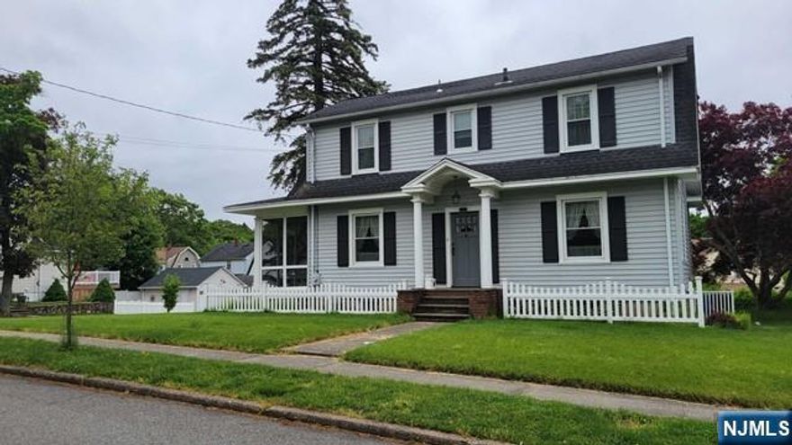 Welcome home! Situated on a quiet street with a corner lot that spans 75x110 ft is this charming Center Hall Colonial with a detached 2 car garage. The first floor welcomes you with an entrance foyer leading to a formal dining room and an inviting eat-in kitchen. Opposite that sits a generously sized living room featuring a faux fireplace and a lovely enclosed porch. Upstairs, discover a sizable primary bedroom boasting dual closets, along with two more bedrooms and a full bathroom. The heated basement offers a finished bonus room, a convenient full bathroom with a walk-in shower, ample storage space, and a laundry room with washer and dryer included. Some other enhancements worth noting are the central air conditioning, lovely wood floors, vinyl siding and a Trex deck perfect for outdoor enjoyment. Not to mention the interior got a new coat of paint! Conveniently located near shops, restaurants, and schools, this residence offers an ideal blend of comfort, privacy and accessibility.