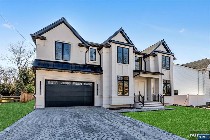Stunning New Construction home in the Highly Desirable Paramus! Designed by the award-winning architect Robert Zampolin and built by one of Bergen Countyâ€™s most esteemed builders, this custom home features 6 spacious bedrooms, each with an en-suite bath and walk-in closet, along with 6.5 luxurious bathrooms. A grand 2-story foyer leads to a chefâ€™s kitchen with designer cabinetry and professional-grade appliances. The open layout includes a formal living room/library, dining room, butlerâ€™s pantry, breakfast area, guest suite, and a spacious great room. Upstairs, the primary suite boasts a beautiful en-suite bath and custom walk-in closets. The finished basement is perfect for entertaining, with a movie theater, gym, bedroom, full bath, and large rec room. Additional features include a 2-car garage and fully fenced yard. Located on a quiet street with top-rated schools and easy access to major transportation. Donâ€™t miss this breathtaking new home!