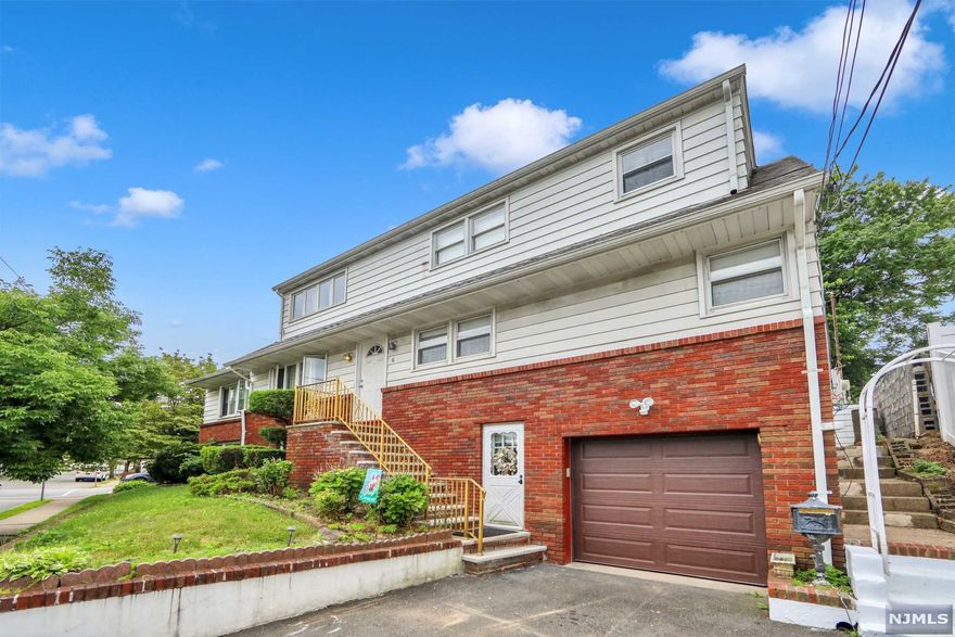 Brick & alum. 2632 sq.ft. 2 family features generous room sizes throughout,this home gives you the space you desire! Upon entering the 1st flr unit you are greeted with a spacious, sun-filled FDR that opens to a huge LR, plenty of custom cabinets & granite counter space adorn the updated EIK-SS appliances, pantry & CT flr, all 3BRs feature tons of closet space, CT bath. 2nd flr offers LR, EIK-CT floor & pantry, 2 BRS, bath, bonus rm & attic stge. Both units offer HW flrs. Inside access through the kit. to full, fin. bsmt. with endless possibilities, rec. room for relaxing, add'l area can be used for exercising/game rm or use this space as an office & work from home, 1/2 bath, ldry & util. area. Built-in 1 car garage & macadam drwy. Patio. Sep. util. Newer furnaces,Replacement windows,Newer HW heater-1st flr. Perfect for investors or owner to occupy. Conveniently located to to parks,schools,& shopping, Desirable location offering easy access to major highways & NYC transportation.