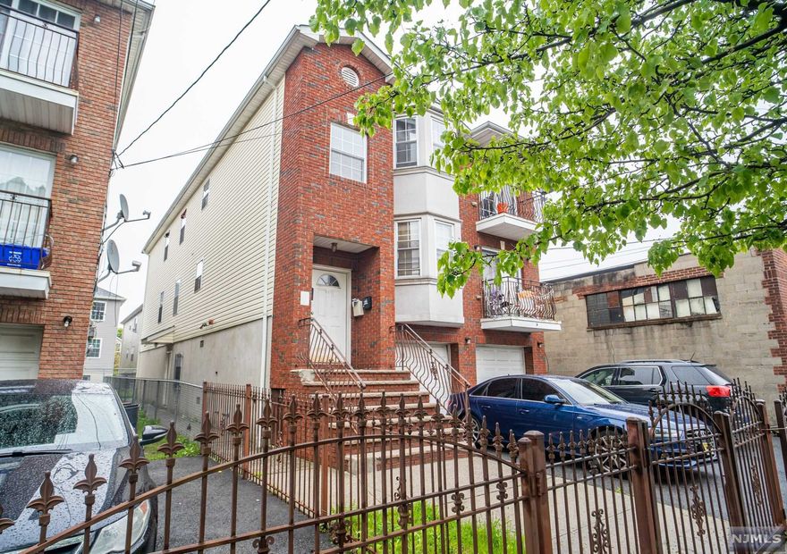 NEWER construction CUSTOM-built three-unit home! This is the perfect opportunity for the savvy investor or home owner trying to live in one unit and rent out the others! PHENOMENAL condition with paying tenants. Forced hot air, two-car garage, hardwood floors, open concept, and tons of natural light. This is THE home for you.