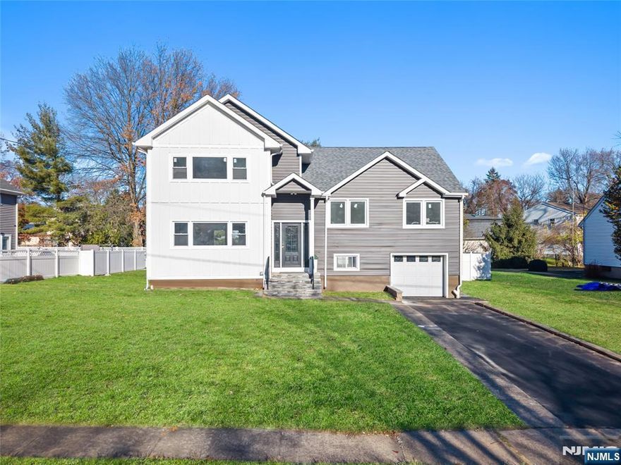 Prepare to be impressed by this fully renovated expanded split-level home in the highly coveted Montclair Heights section. Designed for modern living and unforgettable entertaining, this home features a bright open-concept layout, a showpiece kitchen with quartz countertops, stainless steel appliances, custom cabinetry, and a large island, plus multiple living spaces ideal for today's lifestyle. Enjoy 4 generous bedrooms, including a luxurious primary suite with private spa-like bath, and 3 beautifully updated bathrooms throughout. The finished basement with a full bar elevates your hosting game and adds incredible bonus space. Step outside to your resort-style backyard an absolute WOW featuring a fully equipped outdoor kitchen, above-ground pool, firepit, and expansive space for gatherings of any size. With new systems, updated siding/windows, an attached garage, and a prime location near parks, shopping, dining, and transportation, this home delivers style, comfort, and unmatched lifestyle. Truly a must-see homes like this don't come around often!