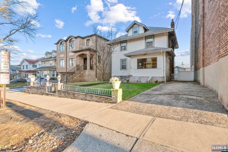 Beautiful 3 bedrooms 1.5 bath, this home features original hardwood floors, a full basement, parking for multiple cars and an amazing backyard. Centrally located near all public transportation to NYC and all shopping and dining areas. This home has been well taken care of and with some TLC and updating has endless potential.