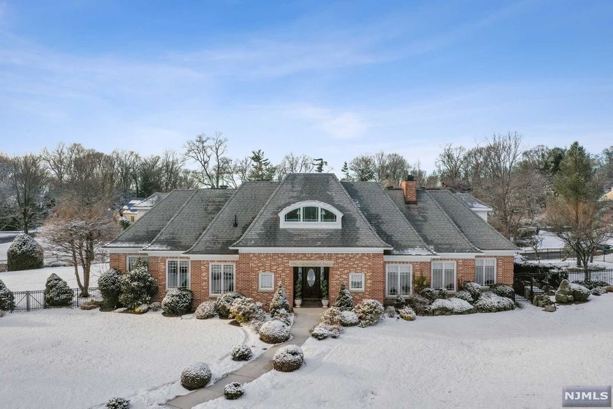 Spectacular custom home that majestically sits on the corner of two cul-de-sacs with lush landscaped grounds. This fully renovated home is the perfect combination of timeless elegance and comfortable living. Abundance of natural light w/ 5 bedrooms, 4 full & 2 half baths. Breathtaking foyer with vaulted ceiling welcomes you with floor to ceiling windows overlooking the courtyard & sunset views! Flow into the open concept living room and dining room with new 3-sided gas fireplace. Upgraded eat-in kitchen provides an abundance of cabinets, breakfast bar, double oven, new stone countertops & backsplash. Convenient first floor laundry room, 2 Bedrooms with high ceilings, new full bath w/soaking tub. Luxurious Primary suite w/Juliet balcony, custom walk-in closet and spa bath outfitted w/ Grohe fixtures,separate shower & dual sink vanity. Relax in large soaking tub w/ TV & Bose sound bar. Second level provides a large bonus room, office, custom cedar closet, bedroom w/ en-suite.