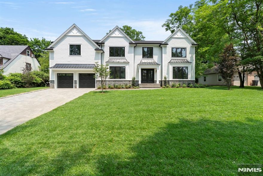 Welcome to this newly built luxury residence offering an unparalleled blend of modern design and thoughtful functionality. With approx 6,700 square feet of elegant living space, this expansive 6-BR, 5.5-Bth home is situated on a generous 100 x 150 lot. Youâ€™re greeted by a paver driveway and walkway that lead to a stately entrance. Inside, discover hardwood floors throughout, soaring ceilings, and a sophisticated open-concept layout designed for both comfort and entertaining. The heart of the home is a modern kitchen, featuring Sub-Zero and Wolf premium appliances, sleek cabinetry, and an oversized center island with quartz countertops. All six bedrooms are generously sized, each offering ample closet space. The luxurious primary suite boasts a designer bath, 2 custom walk-in closets, and peaceful backyard views.The home also includes a full finished basement, ideal for a media room, gym, playroom, guest quarters, or all of the aboveâ€”offering exceptional flexibility and additional living space.Enjoy year-round comfort with four-zone heating and air conditioning, ensuring energy efficiency and personalized climate control.Step outside to your private backyard oasis featuring a bluestone patio and mature trees for added privacy. Located in the heart of Demarest, with top-rated schools, scenic parks, and convenient access to NYC, this exceptional property presents a rare opportunity to own brand-new construction in an established, sought-after community.