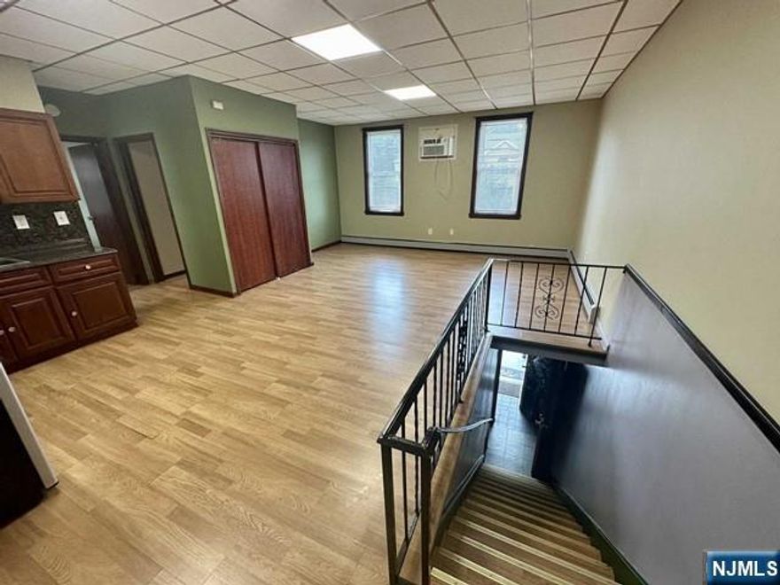 Two bedroom apartment located on the 2nd floor. Less than one minute to routes 46, 80 and 280. The apartment has a large shared back yard and a quaint front porch, partial use of the basement for storage and plenty of parking. Oversized open concept living room /dining room/ kitchen which is great for entertaining.