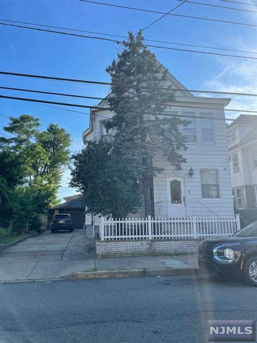 Beautiful 2 Family home in the Hillcrest area of Paterson. 3 over 2 renovated bathroom large apartments. Finished basement with an unfinished high ceiling attic. Detached large car garage and drive way. Can't miss this Opportunity.