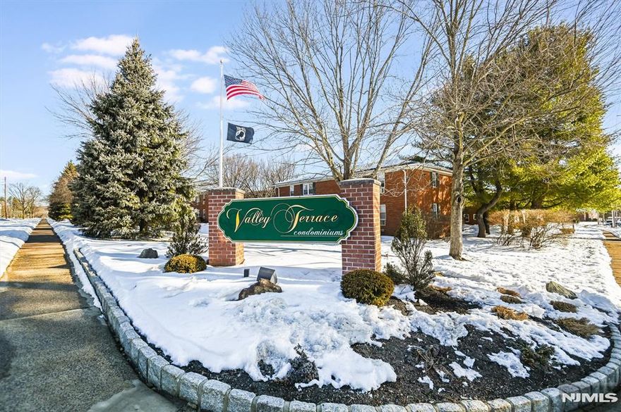 CALL LISA DIRECT AT 973-879-6306 FOR AN APPOINTMENT. DON'T MISS THIS FANTASTIC OPPORTUNITY TO OWN A BEAUTIFULLY UPDATED, SUN-FILLED FIRST FLOOR CONDO IN VALLEY TERRACE. STEP INSIDE TO A SPACIOUS, FRESHLY PAINTED UNIT FEATURING AN OPEN-CONCEPT LAYOUT DESIGNED FOR COMFORTABLE LIVING AND ENTERTAINING. THE KITCHEN IS EQUIPPED WITH RICH CHERRY CABINETS AND SLEEK STAINLESS STEEL APPLIANCES. THE DINING AND LIVING AREAS FLOW AS ONE. OVERSIZED WINDOWS FILL THE SPACE WITH NATURAL LIGHT, HIGHLIGHTING THE HARDWOOD FLOORS THROUGHOUT. THE GENEROUSLY SIZED BEDROOM OFFERS TWO WALK-IN CLOSETS, PROVIDING AMPLE STORAGE. THE BATHROOM FEATURES A TUB/SHOWER COMBINATION AND AN UPDATED VANITY, AN ADDITIONAL STORAGE CLOSET OFF THE LIVING ROOM ADDS EVEN MORE CONVENIENCE. ENJOY ACCESS TO THE COMMUNITY'S OUTDOOR POOL DURING THE SUMMER MONTHS AS WELL AS BEAUTIFULLY MAINTAINED GROUNDS YEAR ROUND. LOW TAXES AND AN AFFORDABLE HOA MAKE THIS PROPERTY ESPECIALLY APPEALING... PLUS, THE HOA COVERS YOUR HEAT, WATER AND EXTERIOR MAINTENANCE. COMMUTERS WILL APPRECIATE THE NEARBY BUS STOP WITH EASY ACCESS TO NYC. WHILE SHOPPING AND DINING OPTIONS ARE JUST MINUTES AWAY. WHETHER YOU'RE SEARCHING FOR A PLACE TO CALL HOME OR A SMART INVESTMENT OPPORTUNITY, THIS CONDO CHECKS ALL THE BOXES. WHY RENT WHEN YOU CAN OWN.