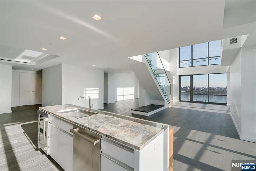 Investor Special â€“ Tenant in Place Stunning 3-Bedroom, 4-Bath Duplex with Panoramic NYC Views at One Park Condos Experience luxury living and breathtaking Manhattan skyline views from this sophisticated two-story residence at One Park Condos, one of North Jerseyâ€™s premier full-service buildings. Perched above the Hudson River, this modern home features an open layout, two spacious primary en-suites, 7â€ white oak hardwood floors, and custom designer finishes. The gourmet kitchen boasts Thermador Pro Series appliances, Cielo Quartzite countertops, and custom white lacquer cabinetry. Enjoy your private balcony overlooking NYC, with motorized shades for comfort and privacy. Residents have access to resort-style amenitiesâ€”including a 24/7 concierge, indoor pool, and fitness centerâ€”all just minutes from Manhattan. With a tenant in place, this property offers both luxurious living and a strong investment opportunity in one of North Jerseyâ€™s most desirable communities.