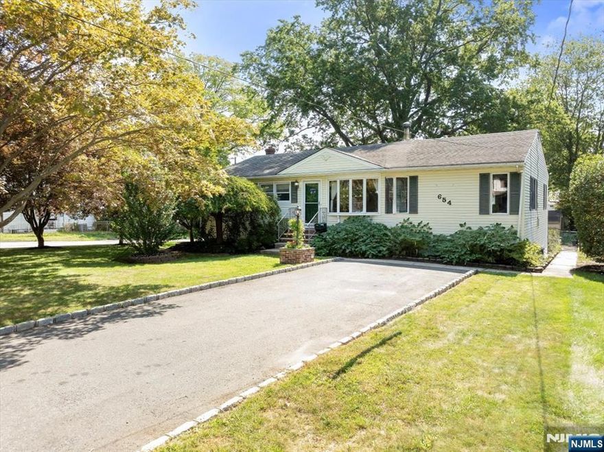 Welcome to 654 E Woodbridge Ave - Over 3,000 SF of Expanded Ranch-Style Living in Avenel! This beautifully maintained expanded ranch-style home offers over 3,000 square feet of total space, including 1,700 SF of open-concept living on the main floor and additional finished space below, perfect for today's flexible lifestyle. Step into a spacious foyer that opens into a bright, flowing layout with hardwood floors throughout. At the heart of the home is the fully remodeled kitchen, featuring premium finishes, a center island with breakfast bar, double oven, and sleek cabinetryall seamlessly connected to the dining area and living room, ideal for entertaining or everyday comfort. The main level features 3 bedrooms and 1 full bathroom, offering the convenience of one-floor living, thoughtfully designed for function and flow. Downstairs, enjoy a large recreation room, pantry, laundry area, an additional full bath, a half bath, and a generous storage roomoffering plenty of space for entertainment, organization, or future customization. Outside, the property spans nearly 1/3 of an acre, complete with a patio, garden area, playset, and a large storage shedperfect for outdoor enjoyment year-round. Conveniently located near the train station, major highways, shopping, and more, this move-in ready home offers space, style, and unbeatable convenience.