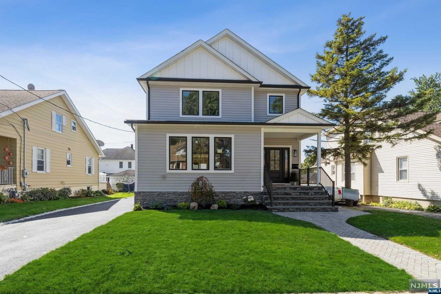 Welcome to your dream home in the adorable town of Maywood! This new construction home boasts 4 bedrooms and 3 full baths with an ideal floor plan that ensures every inch is fully utilized. The first floor welcomes you with a foyer and into an open living room, dining room, and an 8 ft island in the kitchen with beautiful sliding glass doors that lead to a new deck. Off the living area, is a bedroom and full bath with plenty of storage. The second floor has 2 bedrooms and a full bath, and the private primary suite includes a light and bright full bathroom, walk-in closet, and a secondary closet. To complete the second floor is a laundry room with ample storage and functional space. This home has paver walkway, new driveway, multi zoned sprinklers, and professionally landscaped with lighting. Conveniently located one block from Maywood's quaint downtown, near top rated schools, library, and one block from NYC transportation..