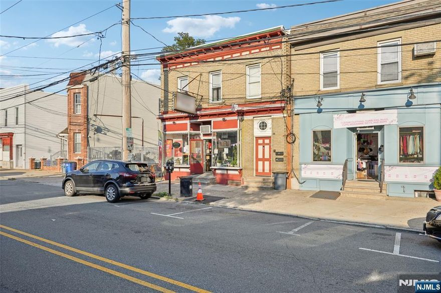 PHENOMENAL OPPORTUNITY TO PURCHASE THIS MIXED USE BUILDING & BUSINESS IN A HIGHLY VISIBLE LOCATION. MAIN FLOOR IS CURRENTLY IN OPERATION AS FRANK'S PIZZERIA - CURRENT OWNER HAS BEEN IN BUSINESS FOR 25 YEARS - PREVIOUS USE: PIZZERIA (APPROX 50 YEARS AS A WELL-KNOWN NEIGHBORHOOD PIZZERIA). FRONT SPACE OFFERS SEATING FOR DINING IN. ALL EQUIPMENT INCLUDED IN THE SALE. LOWER LEVEL USED FOR STORAGE. ACCESS TO BACKYARD FROM MAIN FLOOR PIZZERIA'S KITCHEN. SECOND FLOOR OFFERS UPDATED, TURN-KEY 2 BEDROOM APARTMENT WITH OPEN CONCEPT LIVING ROOM/DINING AREA/ KITCHEN AREA. RENOVATED FULL BATH. ACCESS TO OVERSIZED DECK FROM BEDROOM. DUCT WORK FOR CENTRAL AIR IN PLACE - UNIT NEEDS TO BE REPLACED. PLENTY OF ON STREET PARKING. ACCESS FROM ENTRY VESTIBULE TO SECOND FLOOR APARTMENT & SIDE ENTRANCE TO PIZZERIA. OWNER OCCUPIES THE 2ND FLOOR APARTMENT. BUILDING WILL BE VACATED UPON CLOSING. OPPORTUNITY TO CONTINUE AS A PIZZERIA - EMPLOYEES AGREEABLE TO REMAIN ON STAFF IF NEW OWNER REQUESTS. ROOF IS 2 YEARS OLD. POTENTIAL RENT FOR THE APT $2,500.