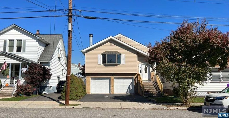 Raised ranch style home with 2c garage, LR/FPL, EIK, 3 Bedrooms and finished lower level with Rec room and possible 4th br. All Cert/inspec resp of buyer.