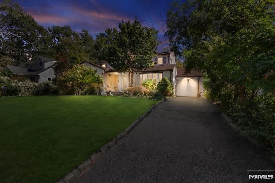 Bring your vision and transform this spacious 3,000 sq. ft. home into your dream residence. Nestled in the heart of River Edge, this property offers endless potential and ample room to customize to your style and needs. The versatile layout features a desirable first-floor suite along with three bedrooms on the main level, making it ideal for extended family, multi-generational living, or hosting guests. Step outside to a walk-out patio, perfect for relaxing mornings or outdoor entertaining. Upstairs, discover an open-concept living space that flows beautifully into an additional bedroom, including a massive primary suite with a full bath and private walk-out deck. The upper level provides flexibility â€” keep the open flow or easily separate the first and second floors for added privacy. This River Edge gem is a rare opportunity to reimagine and personalize a substantial home in a prime location!