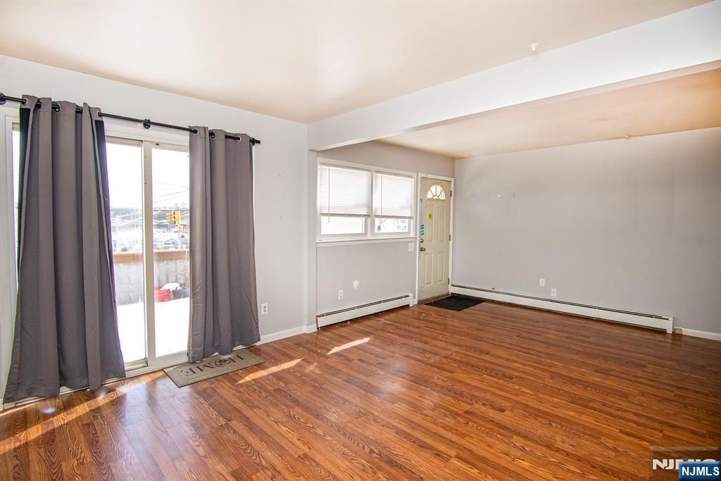 Photo of 7 Westminster Place, Garfield, NJ 07026 (MLS # 26000139)