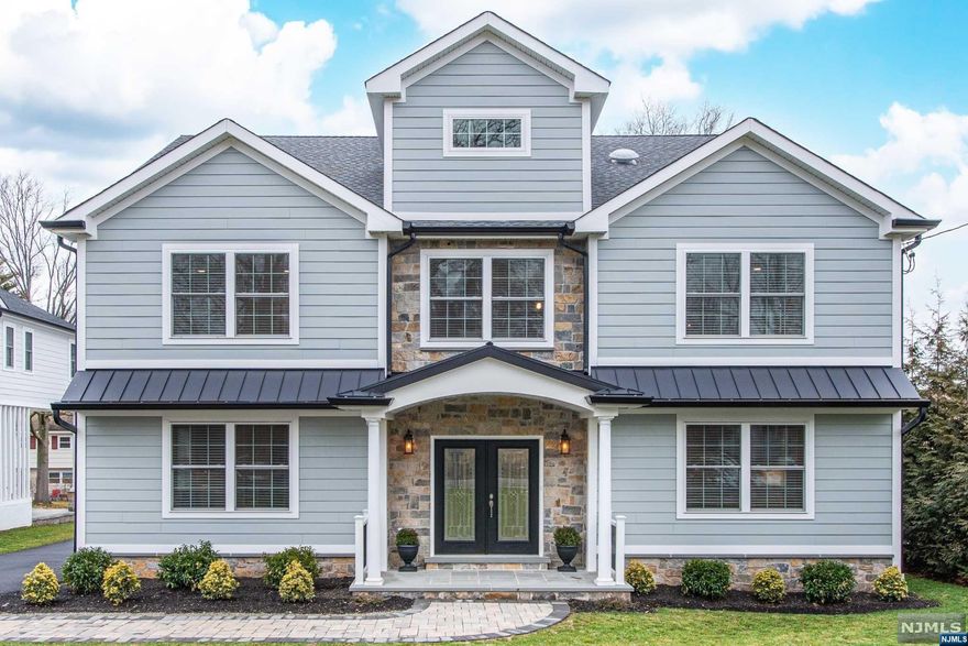 Elegant with a Modern twist describes this two-year young home moments away from Upper Montclair, Brookdale Park & NYC transit. The inviting foyer leads to a spacious living rm, with cozy fireplace and sunlight streaming through the many windows. The generously sized dining rm sets the stage for grand dinner parties & unforgettable gatherings. The gourmet kitchen features a large center island, views of yard," Smart " appliances & additional breakfast room. The 1st fl. bedroom & full bath offers guests privacy or can transform into home office. Ascend the spectacular curved staircase to the 2nd fl to find a laundry rm, 3 bedrooms, one with ensuite bath & a primary suite with spa-like bath. But wait, the 3d fl bonus rm offers additional living space, all you need is imagination. The finished basement with full bath provides endless options, a home gym, yoga retreat, media room or much more. With Spring coming, the large yard with privacy fence & large patio can be your Zen retreat.