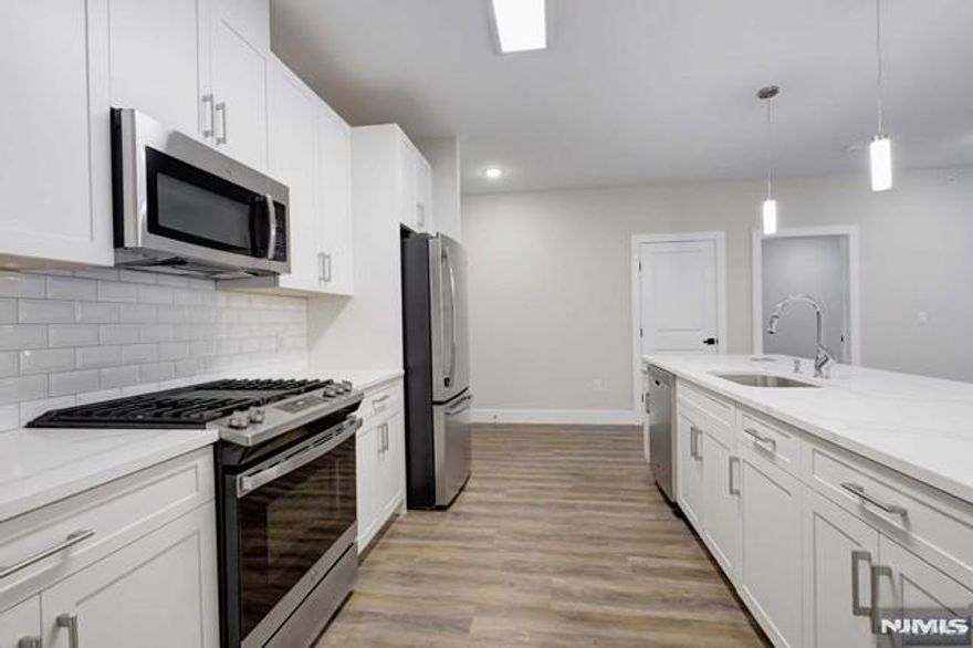 THE PRESERVE AT HILLSDALE, BEAUTIFUL, ELEVATOR BUILDING OFFERING A 2ND FLR, 2BR, 2 BTH. MOD WHITE KITCHEN W/BREAKFAST BAR, QUARTZ CTRS, SS APPLIANCES, LIVING RM/ DINING AREA, PRIMARY BR W/MBTH, BR, FULL BATH, LAUNDRY IN UNIT, OTHER FEATURES INCLUDE FITNESS CENTER, COMMON LOUNGE W/POOL TABLE, OUTSIDE PATIO, ASSIGNED PARKING. PETS UNDER 30 LBS(FEE). CREDIT CHECK, APPLICATION, AND RENTER'S INSURANCE REQUIRED. CLOSE TO TOWN, TRAIN, & NYC TRANSPORTATION.PHOTOS FROM A SIMILAR UNIT