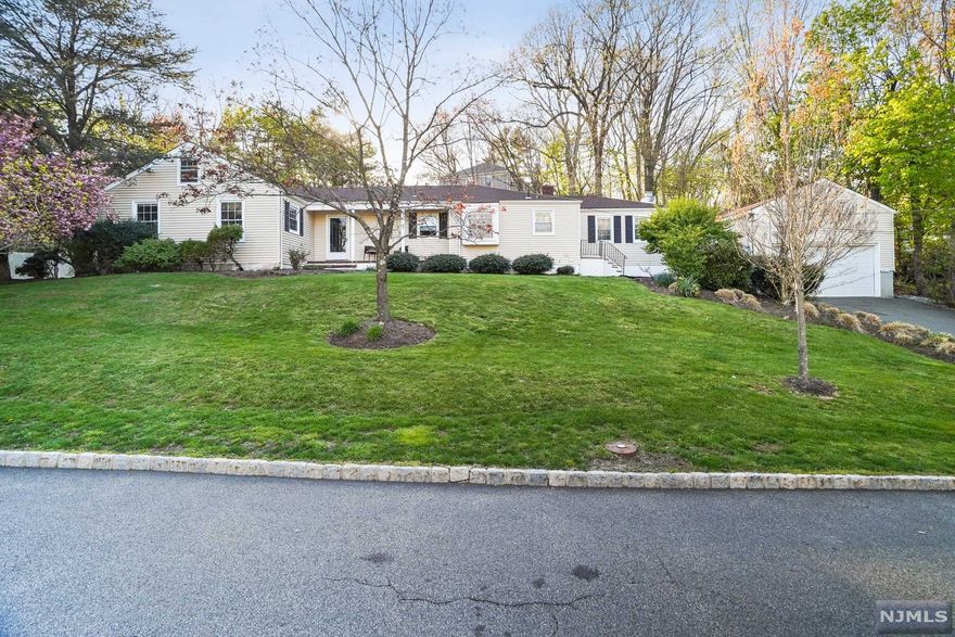 Sunny,sprawling ranch featuring 4 bedrooms, 3 1/2 baths & office on main level, 29' x 29' remodeled family room with high ceilings & brick fireplace. Large mudroom off 2 car garage on main level! Finished basement w/ full bth additional room plus storage closet! Large deck for enjoying the out doors