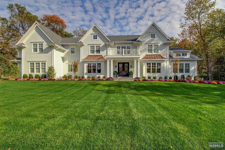 Luxury new construction colonial w/ an abundance of upgrades! Lush landscaping & amazing curb appeal.Enter a grand foyer w/ tall ceilings & a sweeping staircase.The bright & open layout features hardwood flooring, crisp neutral tones,tons of windows,& elegant millwork.Coffered ceilings, high end lighting,& custom built-in bookcases in the family room,along w/ a cozy fireplace.Other rooms include a formal dining room & a formal living room for entertaining guests.The eat-in kitchen has high-end appliances,custom cabinetry,sleek countertops,an expansive island & chic pendant lighting.1st floor guest retreat completes the 1st floor.2nd floor bedrooms include spacious closets & private bathrooms.Master features a fireplace and built-in bookcases for storage.The back porch is great for entertaining,w/ a built-in BBQ,space for dining al fresco, & a dramatic stone fireplace.Saltwater pool & spa offers a great place for soaking up the sun and plenty of lawn for outdoor recreation