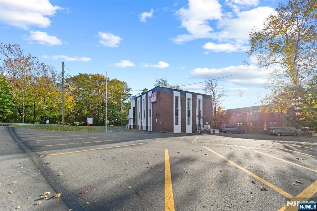 Photo of 201 Lower Notch Road, Little Falls, NJ 07424 (MLS # 25039624)