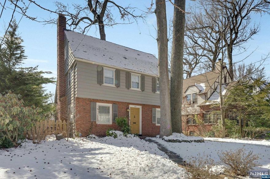 Nestled in the historic Manor District, this colonial-style home stands as a testament to timeless craftsmanship and classic features. With 3 bedrooms and 1.5 baths, you have the charm of oak floors that span all three levels, the ground floor recently refinished in 2019.The open floor plan connects a spacious dining room to a living area on the ground floor, creating an ideal space for gatherings.Step into the inviting warmth of the fully heated, south-facing sunroom with windows on three sides, providing a sunlit retreat year-round.The full finished attic is perfect for a home office, art studio, or playroom with ample storage.Modern comforts include central air conditioning installed in 2021.The fully fenced backyard is an ideal private outdoor space. A one-car garage offers parking and storage. The mature shade trees surrounding the home provide a natural coolness during the summer months.Discover the perfect blend of historic charm and a classic living experience in this gem.