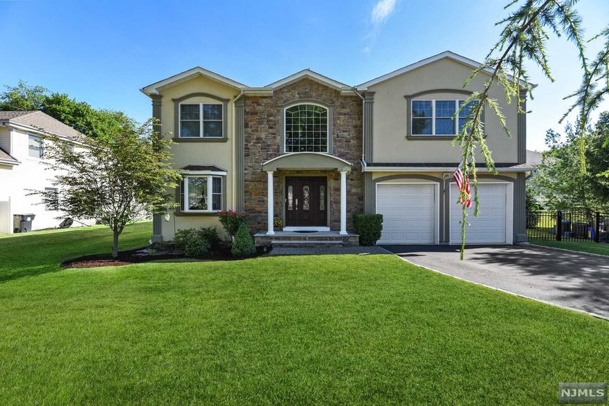 Now's your chance to own this beautifully crafted, newer custom colonial in highly sought-after Whippany! Step inside the 2-story entry to find a perfectly designed, open concept Living, Dining & Eat-In-Kitchen which flows naturally from one room to the next! Kitchen is equipped w/ stainless steel appliances, 9-foot center island, granite countertops, & TONS of natural light. An extravagant Family room is just beyond the kitchen w/ cathedral ceilings & gas fireplace! Continue upstairs to your master suite privately located on the right wing of the home. Master includes cathedral ceilings, 2 large closets, a private balcony w/ French doors overlooking the yard & full ensuite w/ jetted tub & stall shower. On the west wing are 3 nicely sized bedrooms, one of which has a private bath w/ stall shower. A convenient Jack & Jill bath w/ shower/tub combo connects the other 2 BRs. An extra-large hallway closet offers a possible 2nd floor laundry option! Finished basement & fenced in yard!