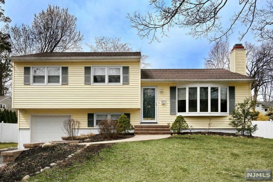 YOUR SEARCH ENDS HERE! PREMIER TOWN, PREMIER STREET! THIS EAST-FACING HOME OFFERS A WELL-DESIGNED, OPEN FLOOR PLAN FOR TODAY'S EASY LIVING DEMANDS. GLEAMING WOOD FLOORS WELCOME YOU. LARGE SUNNY LIVING ROOM WITH BOW WINDOW AND MARBLE TRIMMED FIREPLACE. FORMAL DINING AREA. BEAUTIFULLY DESIGNED COUNTRY KITCHEN-GRANITE COUNTERS, TILE BACKSPLASH, STAINLESS APPLIANCE, & FORMAL DINING OVERLOOK GREAT ROOM WITH HUGE PALLADIUM WINDOWS, CATHEDRAL CEILING W/SKYLIGHTS, STONE FIREPLACE, SLIDERS TO REAR DECK & FENCED YARD. UPPER LEVEL FEATURES THE PRIMARY BEDROOM, DOUBLE CLOSETS, SECOND & THIRD BEDROOMS. MAIN BATH-SHOWER/TUB. LOWER LEVEL INCLUDES OFFICE/PLAYROOM, WITH SEPARATE ACCESS TO YARD. FULL BATH, LAUNDRY ROOM & ENTRY TO GARAGE. FULL, FINISHED BASEMENT-PERFECT FOR ENTERTAINING-WITH BAR AREA. SEPARATE UTILITY & WORK AREAS. THIS HOUSE HAS HARDWOOD FLOORS THROUGHOUT, NEW RAISED PANEL DOORS, NEWER ROOF AND FURNACE. GREAT LOCATION! NEAR RESTAURANTS, SHOPPING, SCHOOLS & MORE!