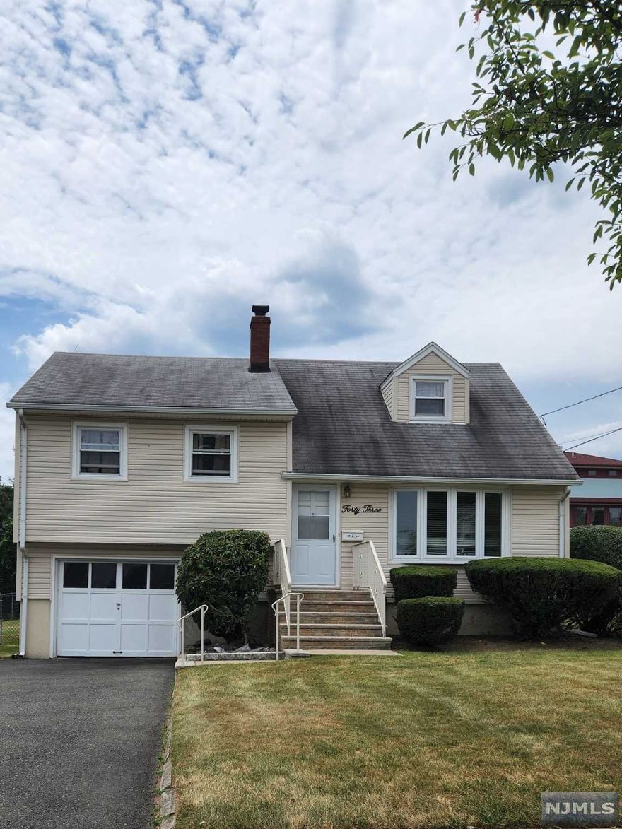 Welcome Home! Hurry in to see this well maintained Split Level on a quiet street. Updated kitchen & bath, HW floors, oversized lot...plus so much more. Large 3rd flr Master Suite with lots of closet space & additional storage. This is the one you've been waiting for!