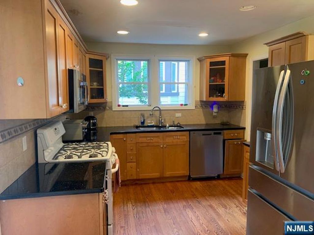 Photo of 166 Herrick Avenue, Teaneck, NJ 07605 (MLS # 25028284)