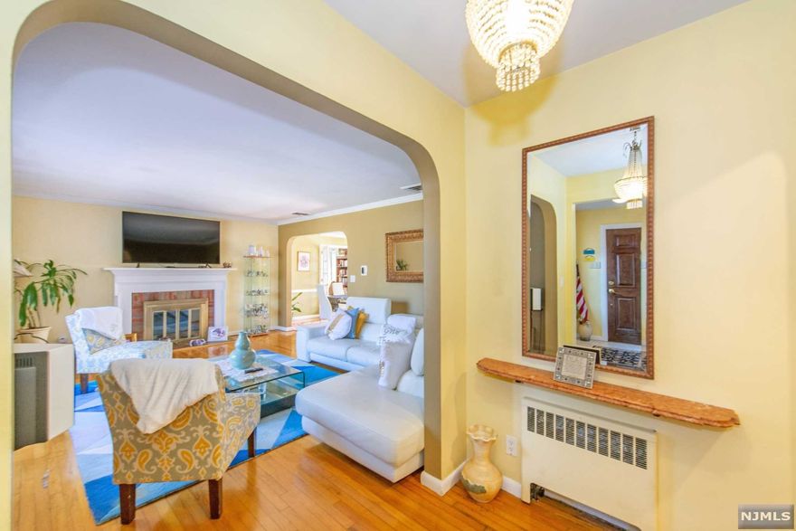 This beautiful, spacious Ranch will instantly calm your senses and brighten your days with its luminous windows throughout. It features a Master Bedroom en-suite with Jacuzzi bath for relaxation, a modern eat-in kitchen with plenty of cabinet storage, an attached 2 car garage and ample parking for six cars. The lower level family room is perfect for entertaining friends and loved ones, and has a doorway that leads to a ground level patio under the gazebo that can also be accessed from a pathway around the exterior of the house. Along with having a floor plan that is ideal for daily living or entertaining, your next home features include gorgeous hardwood floors, large wood burning fireplace, in-ground sprinkler system, and tons of storage. It is within close proximity to town, NYC transportation, and has one of the top-rated school systems in Bergen County. Stop by to enjoy the views. We can't wait to meet you.