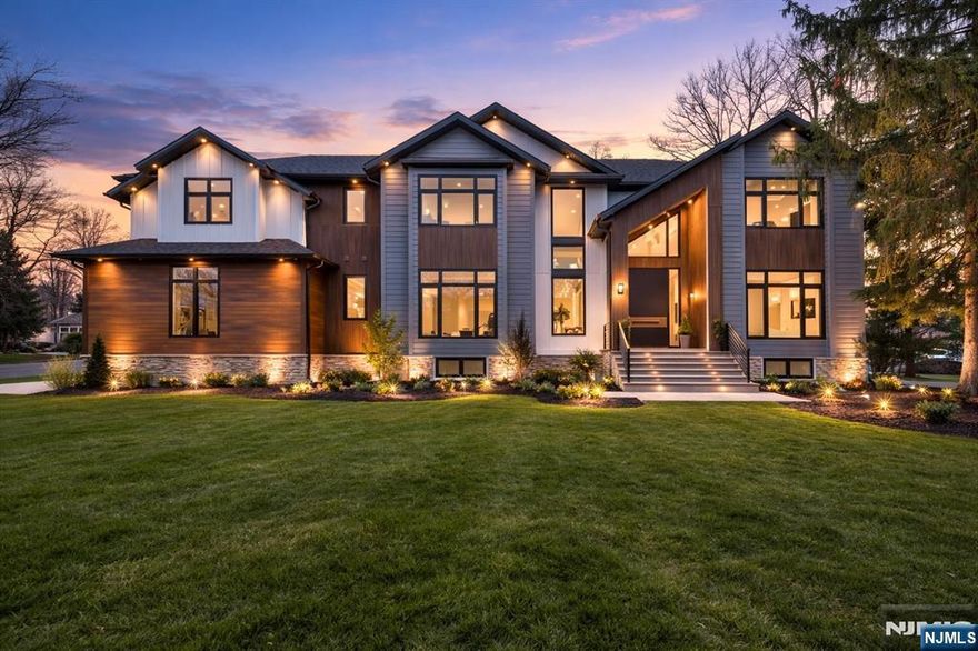 Experience Modern Luxury Redefined in this Stunning Masterpiece, Built & Designed by the renowned NJGCB, an award winning leader in Modern Architecture. Nestled on a quiet cul-de-sac, this New Construction home sits on a one acre lot, offering both privacy & space for Future Pool. Thoughtfully designed w/ Exceptional Craftsmanship, this Custom Home features 6 beds, 6.1 baths, 3 Car Garage - spanning 8,300 sq ft of Finished Living Space. Grand Foyer welcomes you w/Floating Glass Staircases, Massive Floor to Ceiling Windows, Skylights & High Ceilings throughout. Formal Living Rm & Impressive Two-Story Family Room w/Gas FP & 20ft Ceilings. A Dramatic Two-Story Dining Room w/ 27ft Ceilings & Glass Wine Display. Bi-fold Glass Door opens to give Panoramic Views of Covered Patio w/Outdoor Kitchen, Gas FP & Expansive Yard. The Heart of this Home is your Gourmet Kitchen, where every element was Meticulously Crafted. Professional grade SS Viking appliances, an abundance of Sleek Custom Cabinetry, Center Island, Breakfast Room, Walk-in Pantry & Butler's Pantry. An Oversized First Floor Guest Suite w/Full Bath & WIC offers convenience & accessibility. Large Storage Rm, Half Bath & Mudrm. Second floor offers a Private, Beautifully Appointed Primary Retreat w/ Balcony, Gas FP, 2 Custom WIC's, Coffee Bar & Spa Inspired Bath w/dual Showers & Tub. Three Large En Suite Guest Beds w/WIC's & Laundry Rm. Finished Walk-Out Basement w/ Media Rm, Bedroom, Bath, Gym, Office, Wet Bar & Rec Room.