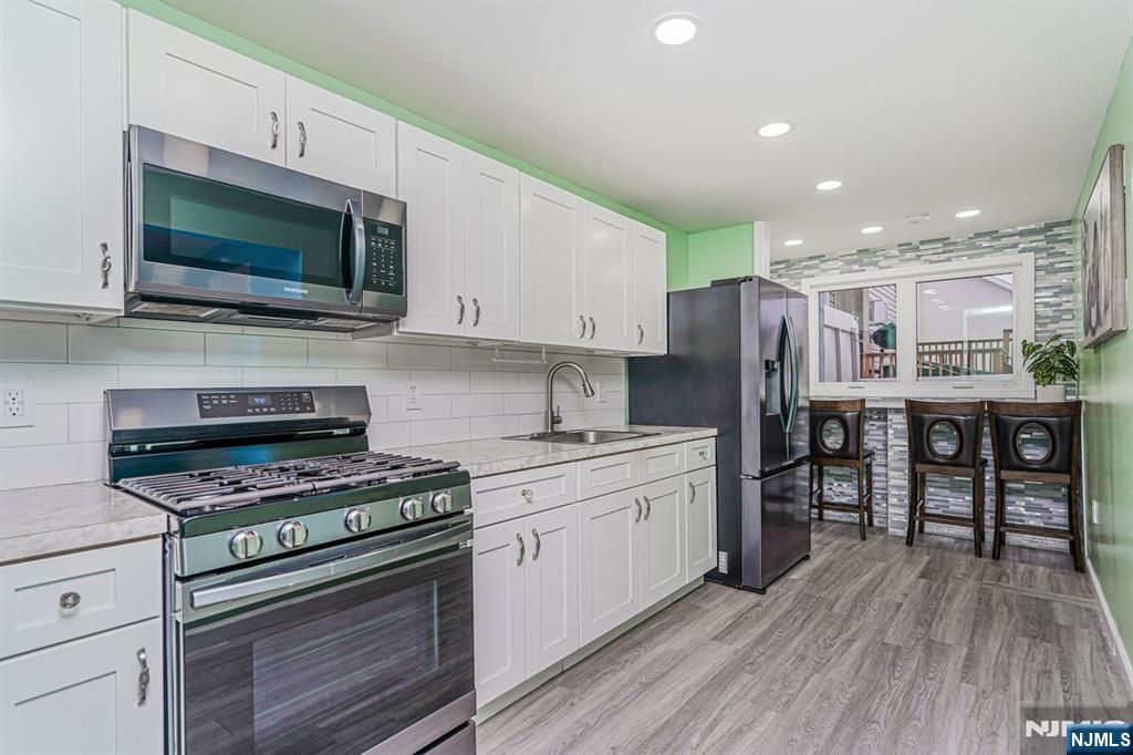 Photo of 389 Madeline Avenue, Garfield, NJ 07026 (MLS # 26011903)