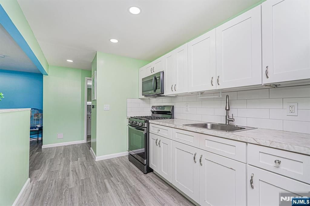 Photo of 389 Madeline Avenue, Garfield, NJ 07026 (MLS # 26011903)