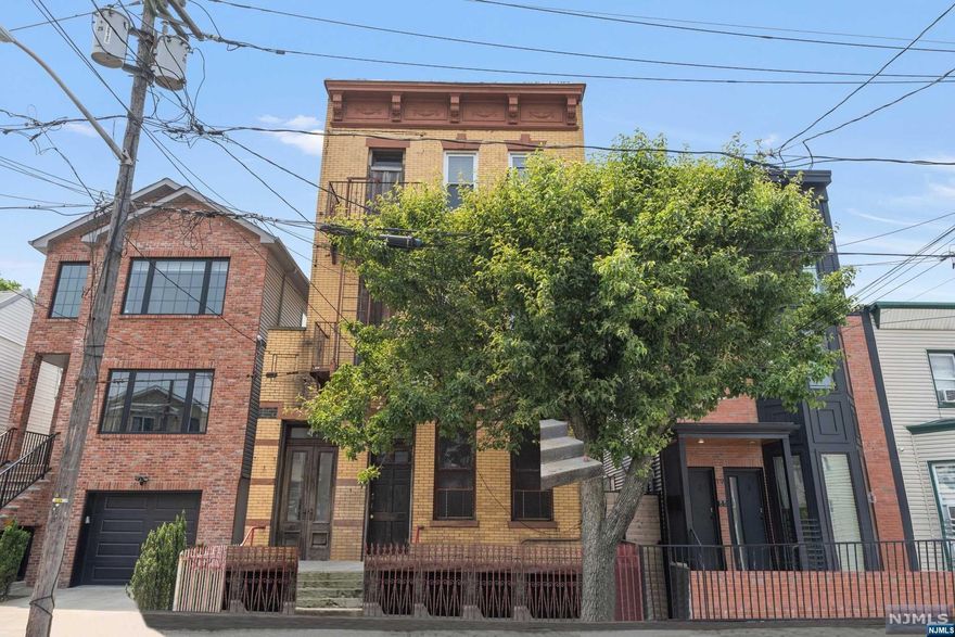 Large legal 3 family, 2BR/1Bath for each unit with extended large rear house at 1st unit for any possibilities. 1st floor unit has double height ceiling with old charm Jersey city industrial style interior deco and vestibule. Located ideal for both public and hwy access to commute to NYC in few blocks to Route 1 & 9 to access to major hwy junctions and also Light rail Ninth street/congress street station. Also a mile away from Lincoln tunnel and Holland tunnel. All convenient to park like Washingto Park and shopping and groceries. To help visualize this home's floorplan and to highlight its potential, virtual furnishings may have been added to photos found or enhenced in this listing. Strictly sell as is. Buyer is responsible for C.O. and any city required inspection with costs. Financial available; Cash only or Hard money lending. Sellers will review offers after the property has been on the market 7 days.