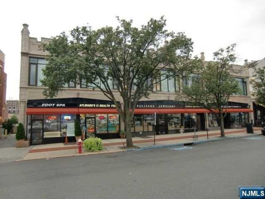 2nd floor walk-up Move-In condition Large open space (Office #7), consisting of approximately +/- 1,000 net useable square feet (approximately +/- 1,150 gross rentable square feet), with 11'+ ceiling height; Newer custom vinyl flooring throughout; Newer LED lighting throughout; Only office on 2nd Floor with it's own sink/vanity, custom counter top and 2 under counter refrigerators ("as is"); 1 wall with custom shelving and cabinets; Space is ideally set up for Showroom, Artist, Painter, Photographer, Art Gallery, etc.; Space rented "As Is"; CCO at the sole cost & expense of the Tenant; Heat, water and all real estate taxes included in rent; Tenant pays electric by separate meter directly to PSE&G; Tenant supplies and maintains their own window air conditioning (2 existing window a/c unit included "as is"; Minimum 3-month security deposit required; No on-site parking; Street parking only or Tenant can pay for monthly permits in one of Englewood's Municipal parking lots