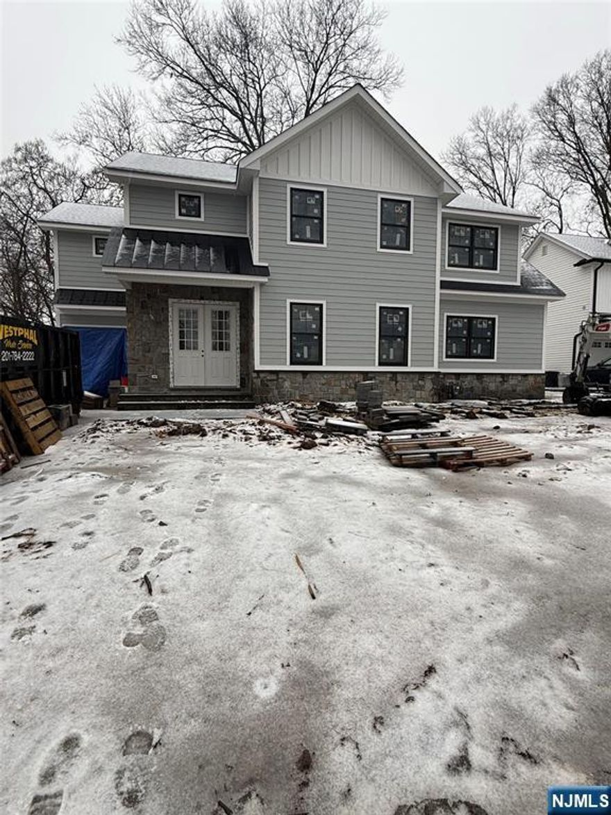 Welcome to a stunning new construction home built on an existing foundation. This meticulously designed property offers 5 spacious bedrooms and 4 bathrooms, providing ample space for comfortable living. The residence boasts impressive 10-foot ceilings, creating an open and airy atmosphere throughout. The layout is thoughtfully designed to cater to both family living and entertaining, with generously sized rooms and high-quality finishes. The kitchen is equipped with state-of-the-art appliances and ample counter space, ideal for culinary enthusiasts.Located in the desirable community of Glen Rock, this home is conveniently close to top-rated schools, making it an excellent choice for families. The neighborhood is known for its welcoming atmosphere and strong sense of community. This house is a perfect blend of modern amenities and classic charm, offering a unique opportunity to own a home in one of New Jersey's most sought-after areas.