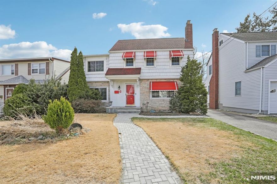 Beautifully set in a prime, highly desirable location, this charming 3BR/2FB Colonial delivers space, character, and exceptional versatility. The first floor features a warm living room with fireplace, elegant dining room with built-ins, and a stylish MEIK with custom cabinetry, granite, and stainless steel appliances. A bright den/office, full bath, and inviting 3-season porch add incredible everyday living and entertaining options. Upstairs offers a comfortable primary bedroom, two additional bedrooms, and a full bath. The full finished basement provides great bonus space. A rare 3-car tandem garageâ€”perfect for a collector, hobbyist, or extra storageâ€”sets this property apart. Central air, fenced property, and an unbeatable location complete this standout home.