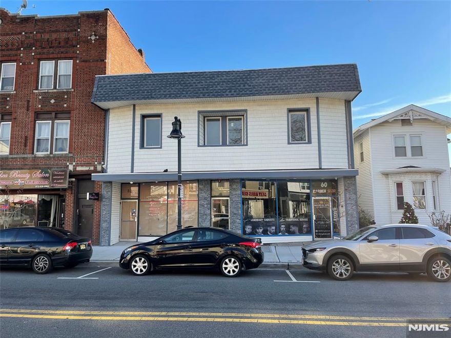 Situated in Garfieldâ€™s redeveloped sought-after â€œRestaurant Rowâ€ district, 60 Passaic St. is a four-unit mixed-use property featuring two commercial units and two residential units (two-bedroom and three-bedroom). Endless developer potential. The property underwent an extensive renovation in 2018, with a subsequent enhancement of the residential units in 2023. The three-bedroom unit boasts a meticulously crafted, state-of-the-art kitchen and a spa-like, luxurious bathroom, exuding sophistication and elegance. This property includes 6 parking spots in the rear and is just one block from the train station and offers easy access to the Parkway, Route 46, and Route 80. This is a rare opportunity to acquire a well-maintained, income-generating asset in a high-demand area. A liquor license is available for purchase separately. Property is located in an opportunity zone and is sold as-is. Owner holds a New Jersey Real Estate License.