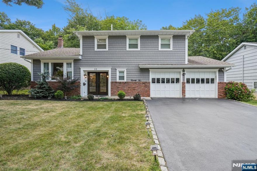 Donâ€™t miss out on one of the most desirable neighborhoods in Roseland â€“ Condit Court. This spacious split level offers 4 bedrooms, 2.5 baths, and 8 rooms total. Features a gorgeous entryway, formal living and dining rooms ideal for entertaining with wainscoting in the dining room, and a family room overlooking the yard with sliders to a back patio. Bedrooms, living, and dining areas are hardwood; foyer and kitchen are tile. Situated on a 70x125 lot with a two-car garage and EV charger. Move-in ready with many upgrades including updated electrical, newer furnace, roof, wallpaper, water softener, and more. Bright, functional layout in a prime location near top-rated schools, shopping, and NYC transportation.