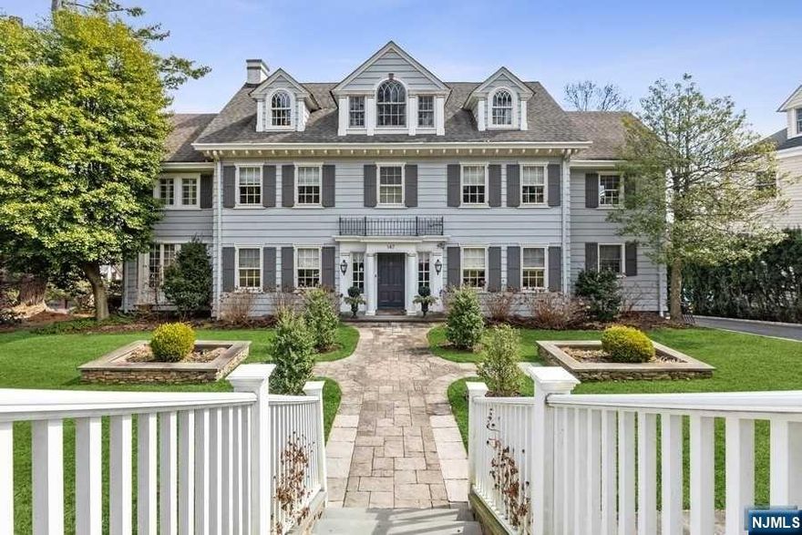 Col located on prestigious Up Mountain Ave offers year-round skyline views. Home boasts lovely blend of period details & contemporary finishes. A welcoming foyer invites you in, where you'll find gleaming hardwood flrs, soaring ceilings, deep crown molding & beamed ceilings. A sprawling living room features a marble wb fireplace with double set of French doors leading to sunrm with charming Juliet balcony. Elegant formal dining has custom built-ins & leads to chef inspired kitchen with high-end custom cabinetry, high end appliances, lg breakfast area. & cozy sitting area w gas fire place. 2nd level offers extraordinary primary suite including sitting rm w custom built-ins, huge WIC & lux bath featuring heated flr & jetted tub. Finished walk-out basement has media rm w kitchenette, bar, full bath, exercise rm, wine rm, mudrm, laundry & storage. Finished walk-out basement has media rm w kitchenette, full bath, exercise rm & wine rm. Professionally landscaped grounds!