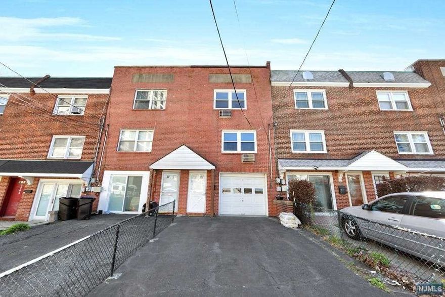 Buyer didn't get mortgage; properties is back on the market. This duplex unit is located in the downtown area, walking distance to school, shopping and Trains with 3 floors. First floor is garage and laundry area towards to the back yard, second floor including living room dining room and kitchen and third floor with 2 bedrooms and one full bath. One car garage and additional 2 parking spaces on the driveway. The home for sale as-is condition.