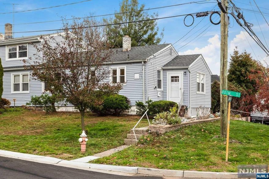 1 Roth St is a quaint 1/2 duplex with 2 bedrooms 1 bath, full size tall walkout basement and 2 car width driveway located on the side of the home. This home has central air and heat! Perfect for a starter home or downsizing with super low taxes under $7,000 in Bergen County.