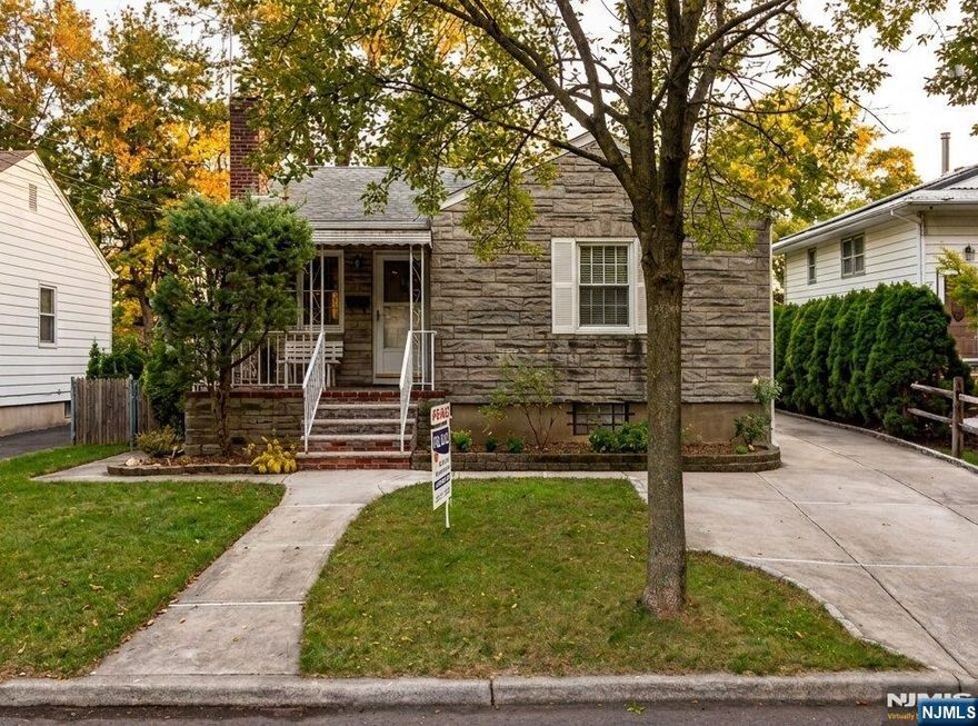 Opportunity awaits in this stone-faced Ranch situated on a dead-end street in the desirable Paramus community. Perfectly positioned for first-time buyers looking to build sweat equity or investors seeking a renovation project, this 1940s-built home offers a functional 6-room layout. The interior features three bedrooms, one full bath, and a living room centered around a classic fireplace. While currently in livable condition, this property provides a blank canvas for updates and modern touches. The exterior boasts a unique stone and aluminum finish on a 50x100 lot, complete with an unfinished basement and natural gas steam heat. Sold As-Is